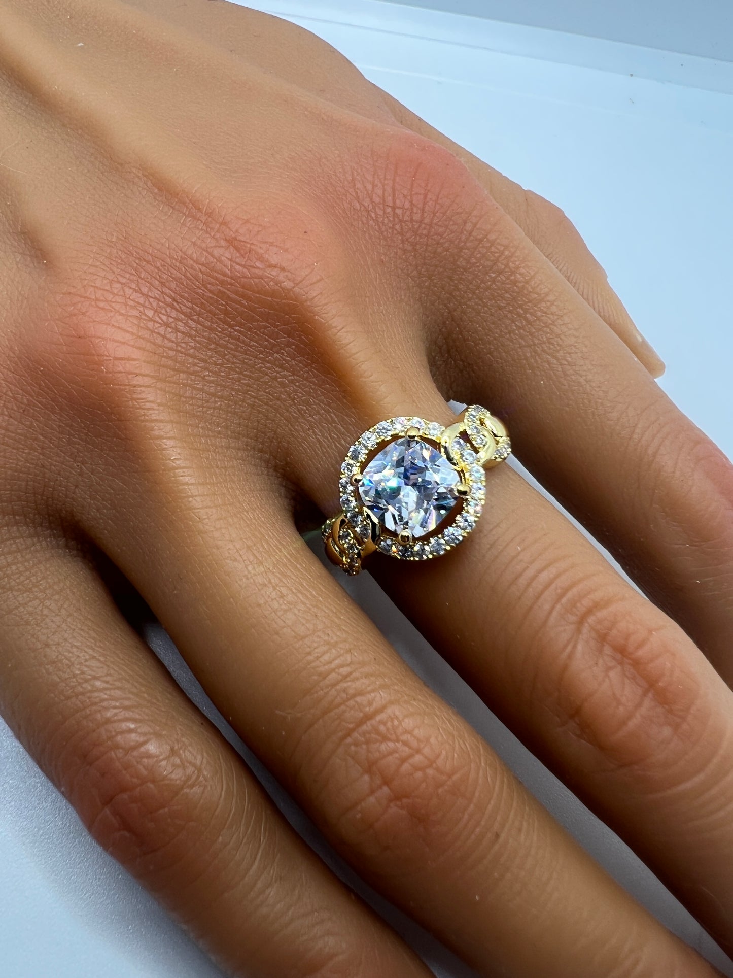 Cushion cut halo detail ring